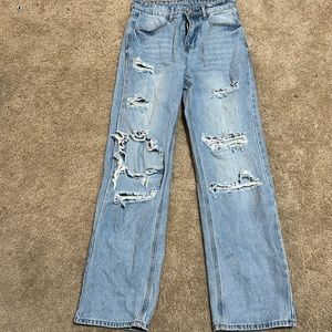 Light blue ripped jeans